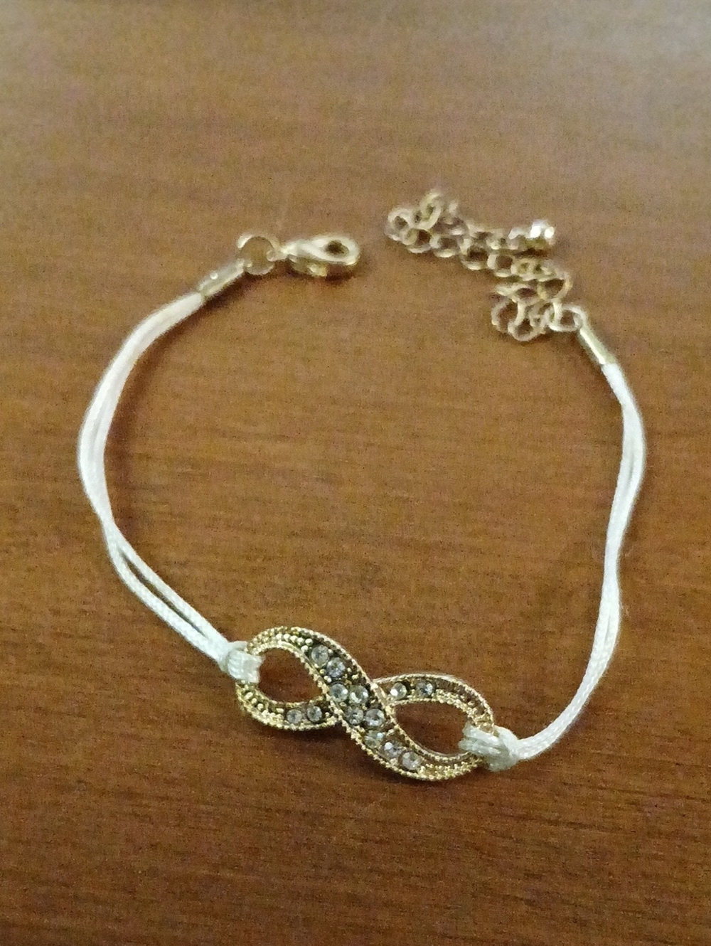 Gold Infinity Crystal Bracelet with White Cord - Adjustable Beautiful